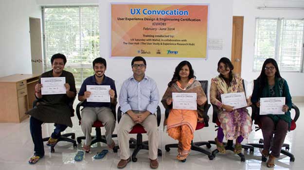 Wahid sitting with UX students on their convocation at Therap