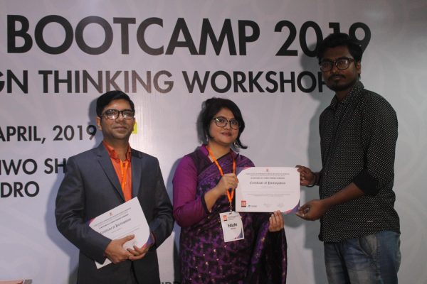 UX Boot Camp participants receiving certificate of participation
