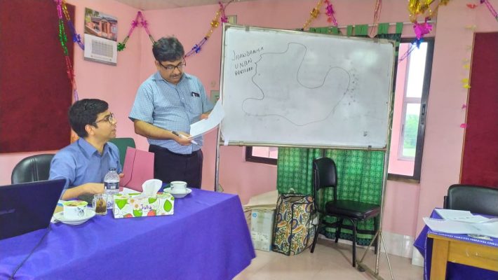 Wahid bin Ahsan (Co-founder, Userhub) and Alok Kumar Majumdar (Country Coordinator, WAI) discussion target people and research locaitons in Satkhira.