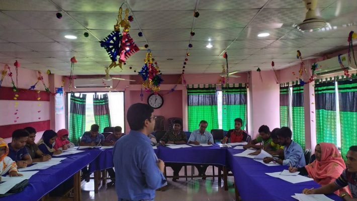 Wahid bin Ahsan (Co-founder, Userhub) explaining qualitative data collection methods to the field researchers in Satkhira