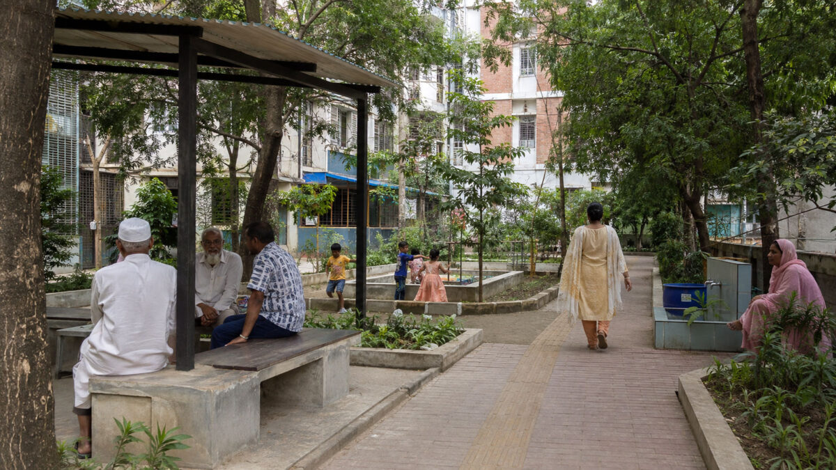 Residents using a green community courtyard in a Bangladeshi urban neighbourhood